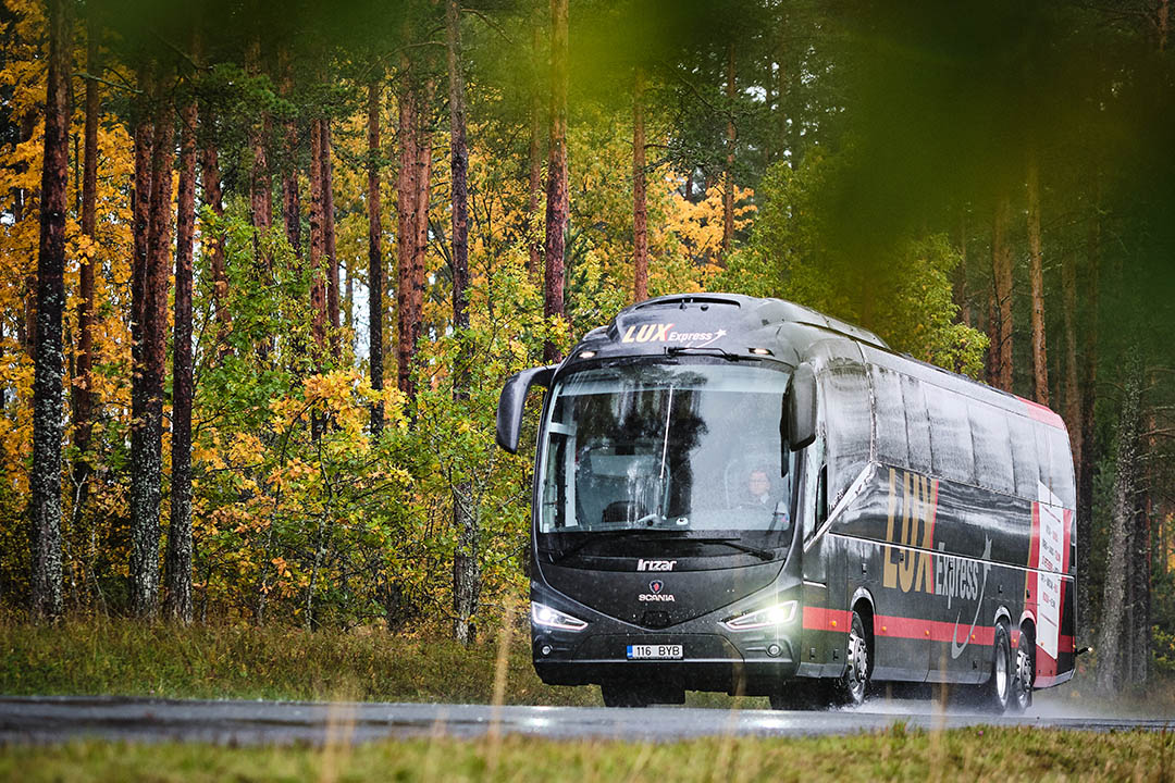 Lux Express coach in summer rain